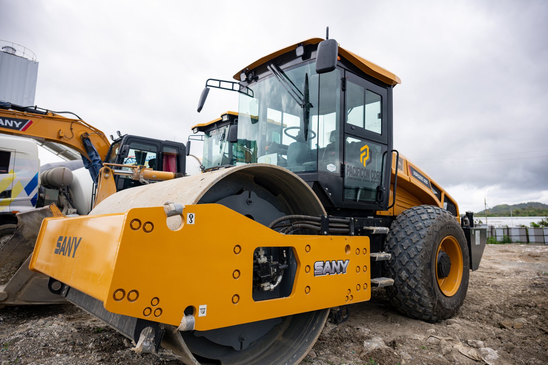 SANY road roller and excavator at the batching plant